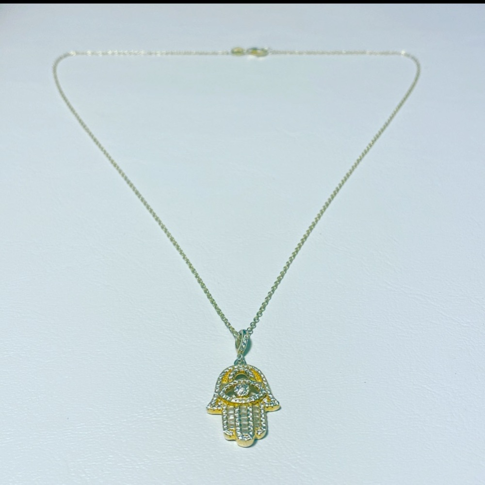 Hand of Fatima and necklace.